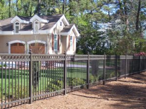  Learn how close you can build your fence to your property line.
