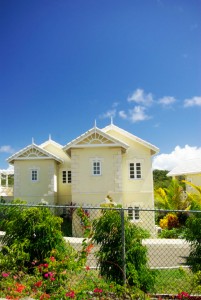 townhouse or villa behind fence