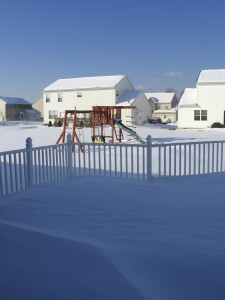 Winter residential fence installation